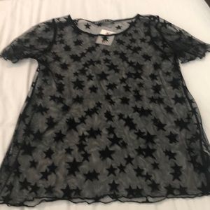 Size small mesh star top. NWT